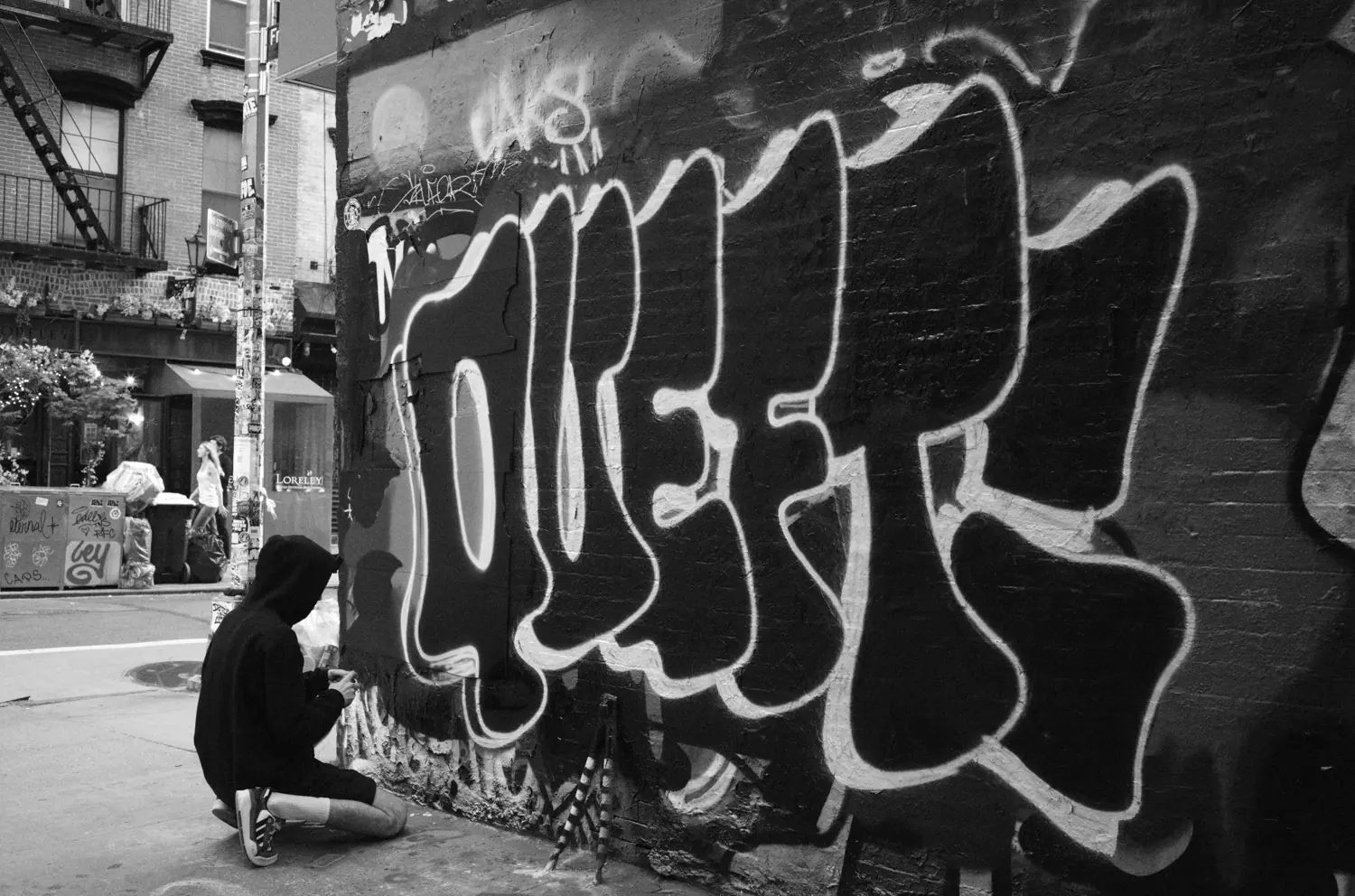Retocando la base del graffiti QUEFT, Nueva York